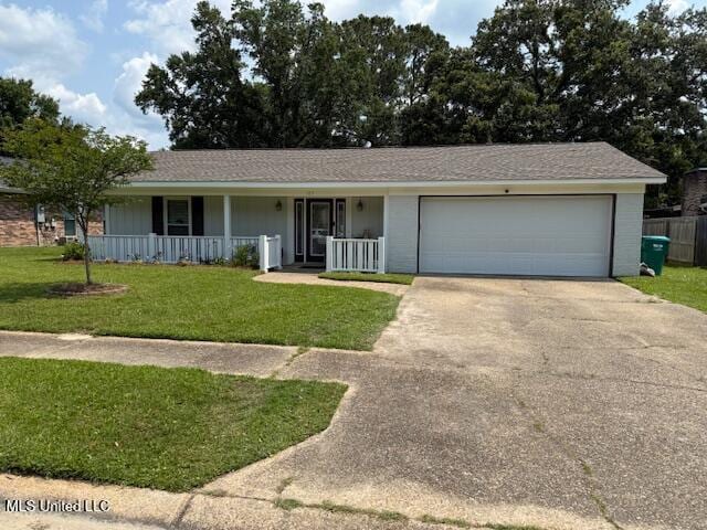 105 Leigh Cir, Ocean Springs, MS 39564 - ranch-style house featuring driveway, covered porch, an attached garage, and a front lawn