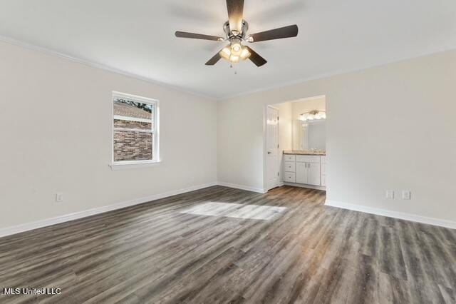 105 Leigh Cir, Ocean Springs, MS 39564 - unfurnished bedroom with wood finished floors, ensuite bath, crown molding, and ceiling fan