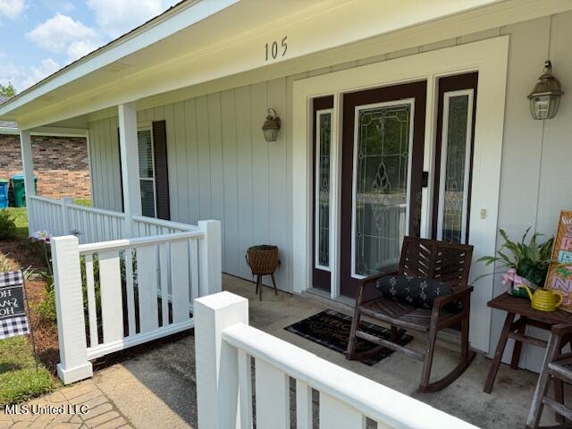 105 Leigh Cir, Ocean Springs, MS 39564 - view of exterior entry featuring covered porch