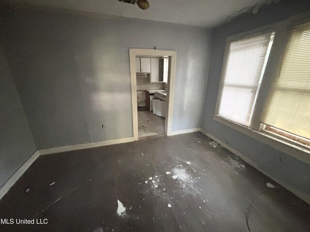 542 Rd Of Remembrance, Jackson, MS 39209 - unfurnished bedroom featuring baseboards