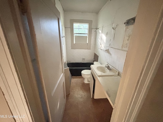 542 Rd Of Remembrance, Jackson, MS 39209 - bathroom featuring toilet, vanity, shower / washtub combination, and tile walls