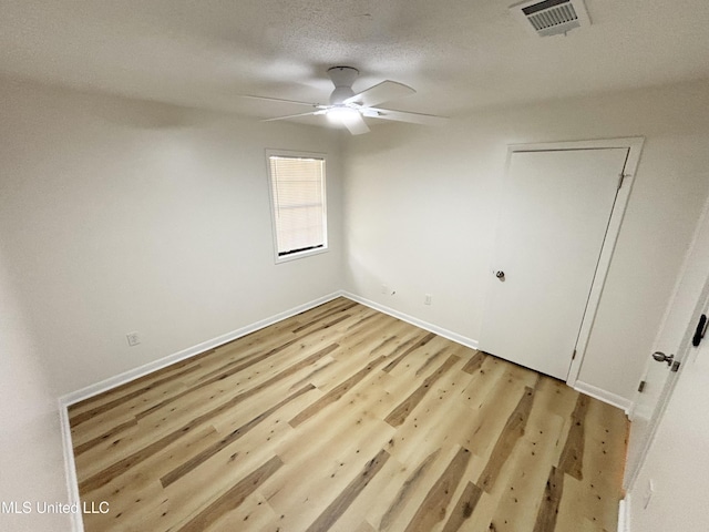 116 Victoria Cir, Newton, MS 39345 - unfurnished bedroom with light wood-style flooring, baseboards, and ceiling fan