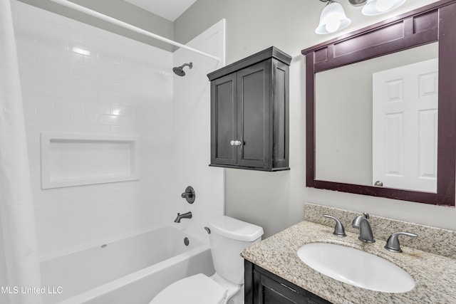 full bathroom featuring toilet, vanity, and shower / bathtub combination with curtain