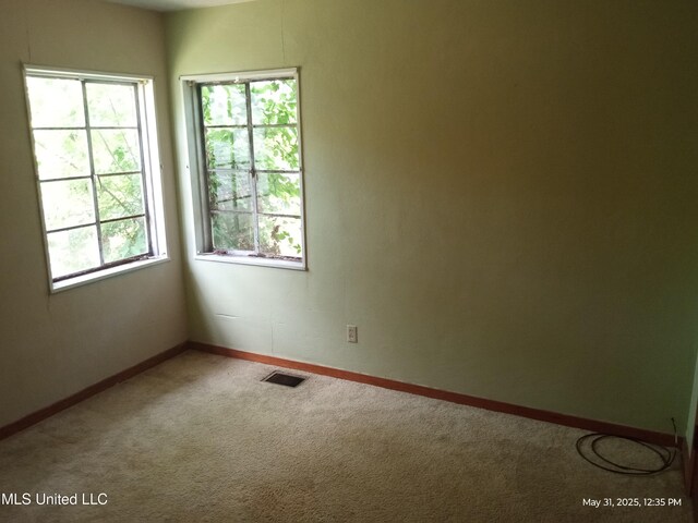 751 Dorgan St, Jackson, MS 39204 - carpeted spare room with healthy amount of natural light and baseboards