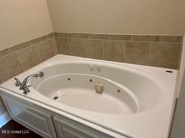 708 Bo Blaze Cv, Brandon, MS 39047 - full bath with a tub with jets