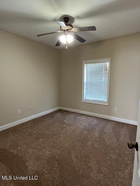 708 Bo Blaze Cv, Brandon, MS 39047 - carpeted empty room featuring baseboards and a ceiling fan