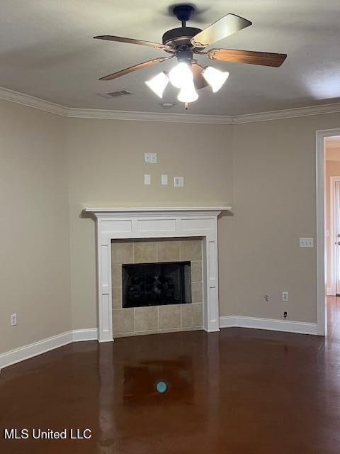 708 Bo Blaze Cv, Brandon, MS 39047 - unfurnished living room featuring crown molding, baseboards, wood finished floors, a tile fireplace, and ceiling fan