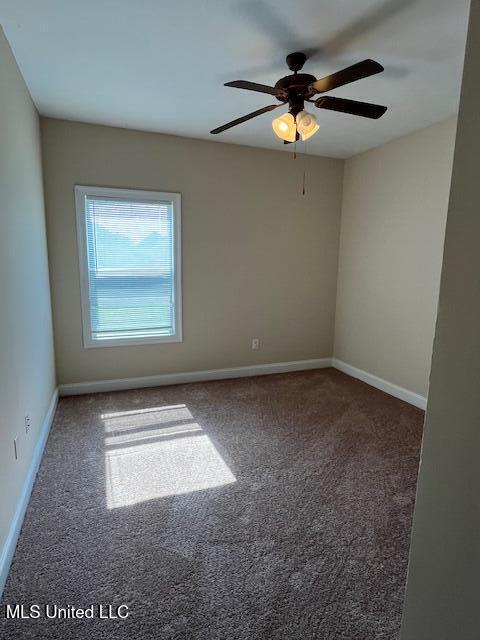 708 Bo Blaze Cv, Brandon, MS 39047 - unfurnished room featuring carpet floors, baseboards, and a ceiling fan
