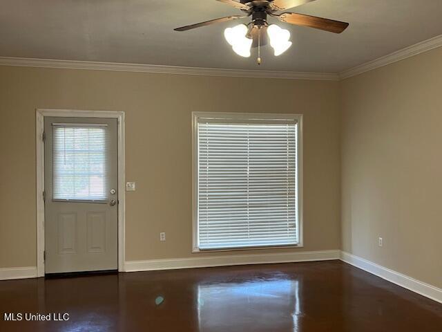 708 Bo Blaze Cv, Brandon, MS 39047 - entryway featuring baseboards, ornamental molding, and ceiling fan