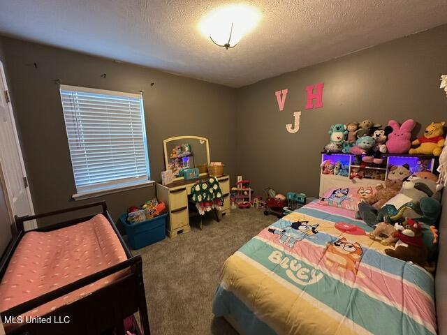 133 Windchase, Brandon, MS 39042 - carpeted bedroom with a textured ceiling