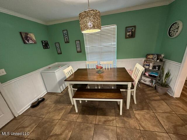 133 Windchase, Brandon, MS 39042 - dining room with wainscoting, tile patterned flooring, and ornamental molding