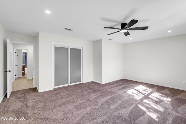 unfurnished bedroom featuring carpet, baseboards, a ceiling fan, and recessed lighting