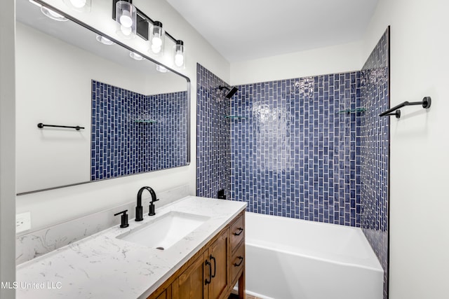 bathroom with shower / bath combination and vanity