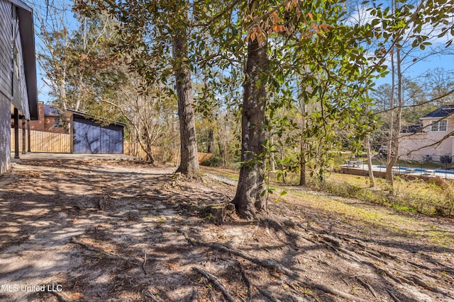 view of yard with fence