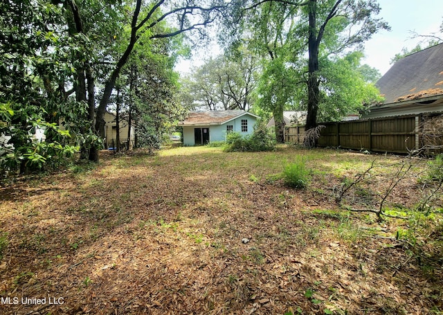 view of yard with fence