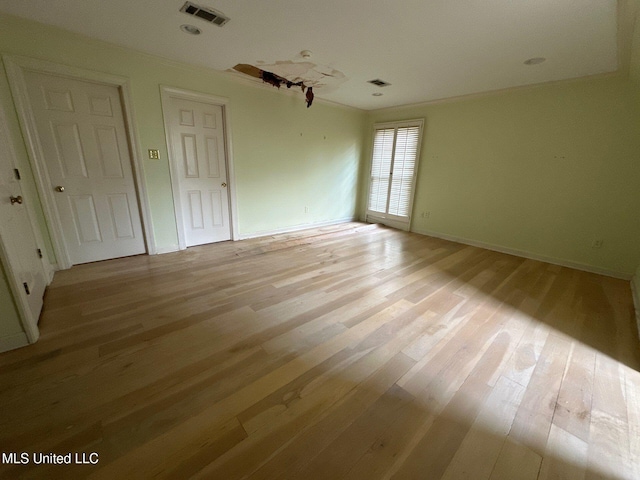 empty room featuring light hardwood / wood-style floors