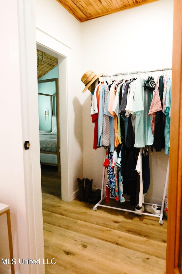 1045 Mckinley St, Waveland, MS 39576 - spacious closet with wood finished floors