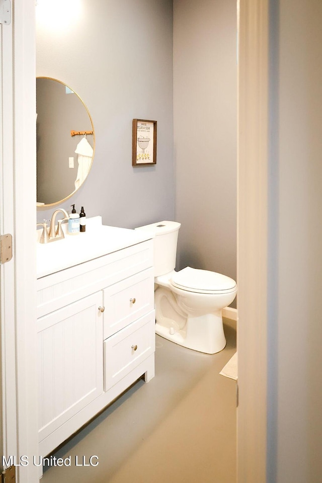 1045 Mckinley St, Waveland, MS 39576 - half bath with vanity and toilet