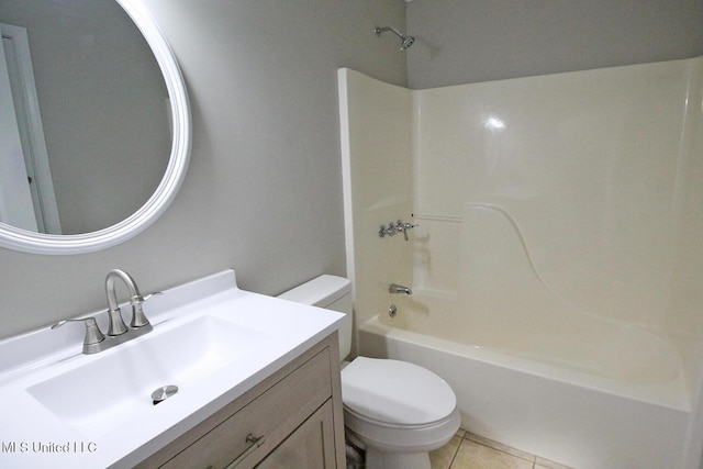 bathroom featuring shower / bath combination, vanity, tile patterned floors, and toilet