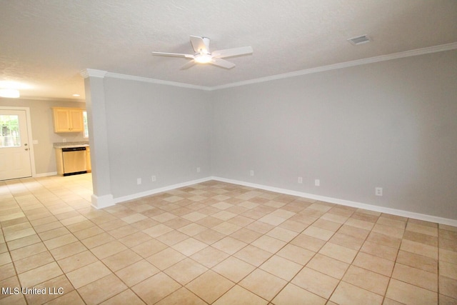 unfurnished room with a ceiling fan, visible vents, light tile patterned floors, baseboards, and ornamental molding