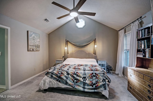 320 Woodhollow Cv, Brandon, MS 39047 - bedroom with light colored carpet, vaulted ceiling, and a ceiling fan