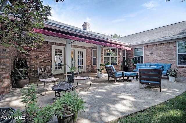 320 Woodhollow Cv, Brandon, MS 39047 - view of patio with an outdoor living space with a fire pit and area for grilling