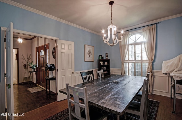 320 Woodhollow Cv, Brandon, MS 39047 - dining area featuring ornamental molding, a chandelier, and wainscoting