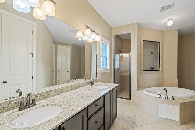 4913 Deer Run Rd, Olive Branch, MS 38654 - bathroom with a stall shower, a bath, tile patterned flooring, and double vanity