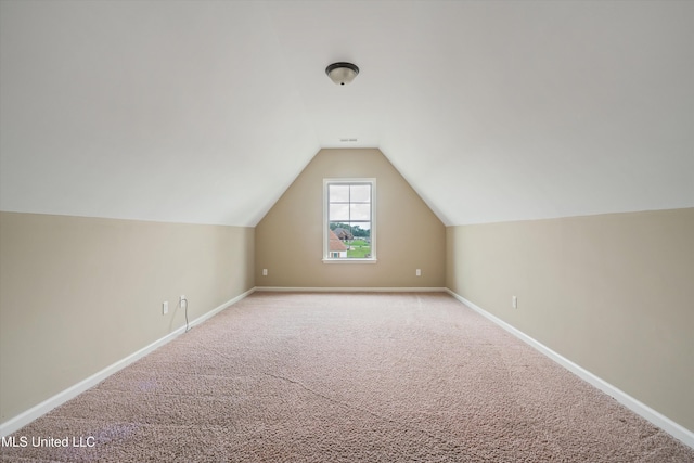 4913 Deer Run Rd, Olive Branch, MS 38654 - additional living space featuring carpet, lofted ceiling, and baseboards
