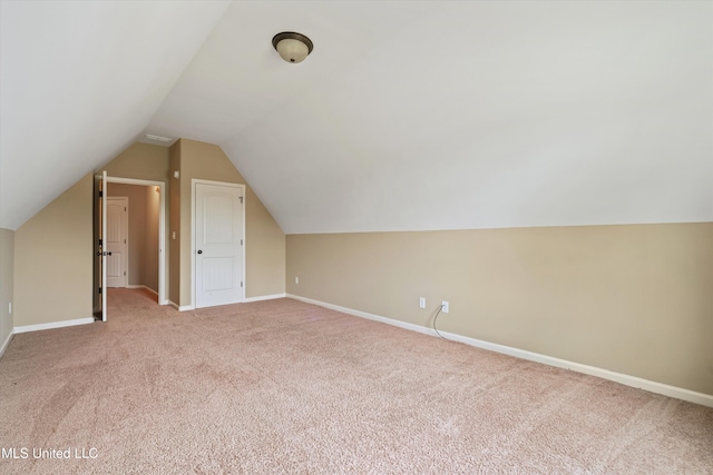4913 Deer Run Rd, Olive Branch, MS 38654 - additional living space featuring light carpet, baseboards, and vaulted ceiling