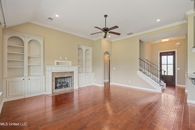 4913 Deer Run Rd, Olive Branch, MS 38654 - unfurnished living room featuring ceiling fan, hardwood / wood-style floors, arched walkways, stairs, and baseboards