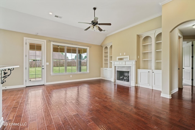 4913 Deer Run Rd, Olive Branch, MS 38654 - unfurnished living room with ceiling fan, arched walkways, wood finished floors, ornamental molding, and lofted ceiling