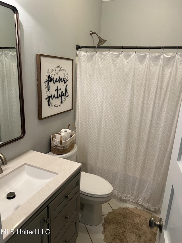 8100 Belle Etheridge Rd, Lucedale, MS 39452 - bathroom with vanity, toilet, tile patterned floors, and a shower with shower curtain