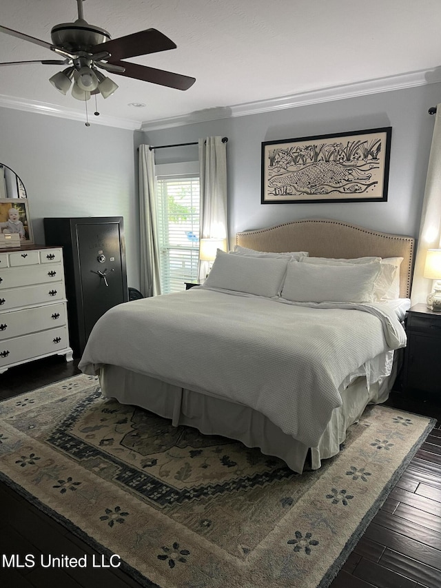 8100 Belle Etheridge Rd, Lucedale, MS 39452 - bedroom with ornamental molding, dark wood-type flooring, and a ceiling fan