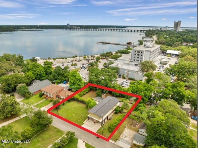 426 Donwood Pl, Biloxi, MS 39530 - aerial view of property and surrounding area featuring property parcel outlined, a large body of water, and a notable bridge