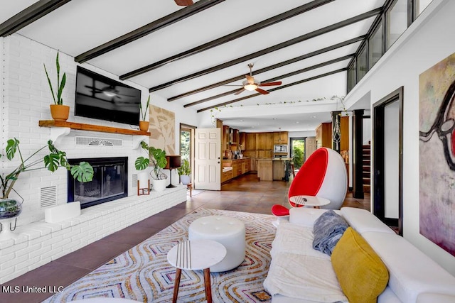 426 Donwood Pl, Biloxi, MS 39530 - living room with a ceiling fan and a fireplace