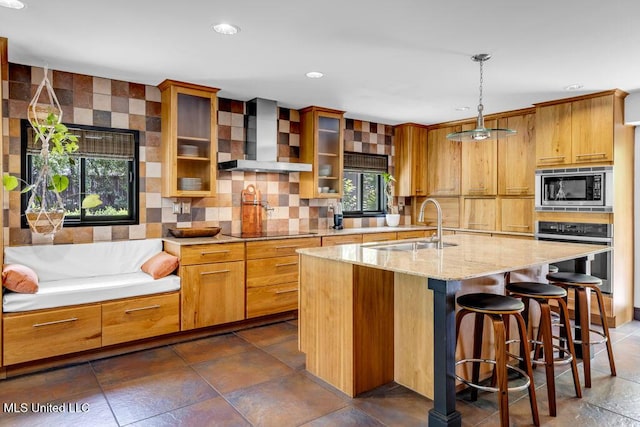 426 Donwood Pl, Biloxi, MS 39530 - kitchen with wall chimney exhaust hood, stainless steel appliances, a sink, tasteful backsplash, and glass insert cabinets