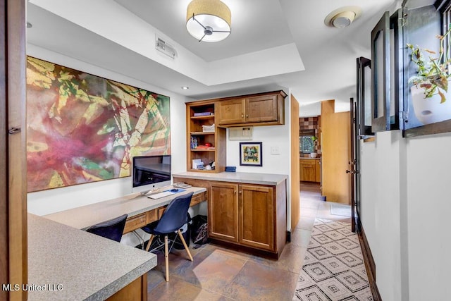 426 Donwood Pl, Biloxi, MS 39530 - office area featuring built in study area and a tray ceiling