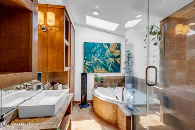 426 Donwood Pl, Biloxi, MS 39530 - full bathroom with a skylight, a shower stall, a garden tub, double vanity, and recessed lighting