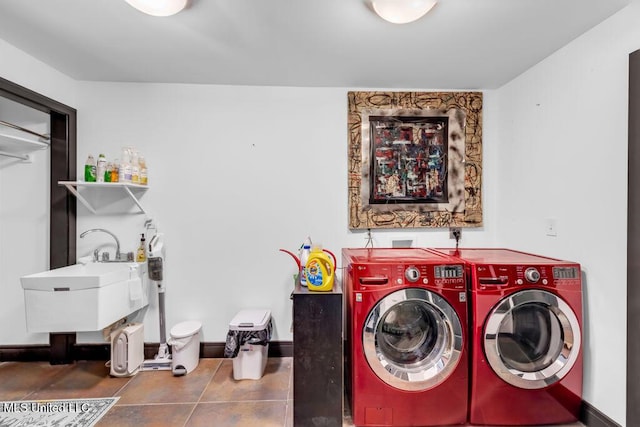426 Donwood Pl, Biloxi, MS 39530 - laundry room featuring washing machine and dryer and baseboards