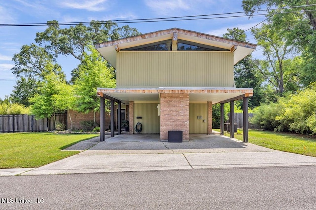426 Donwood Pl, Biloxi, MS 39530 - view of front of property featuring a carport, concrete driveway, and brick siding