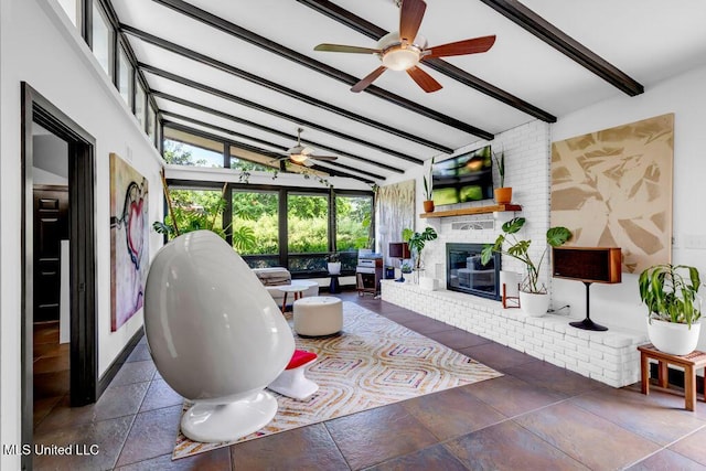 426 Donwood Pl, Biloxi, MS 39530 - living room featuring ceiling fan and a fireplace