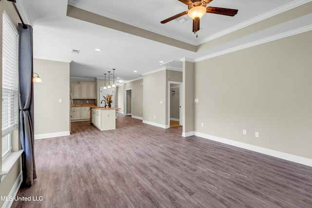unfurnished living room with recessed lighting, a ceiling fan, baseboards, and wood finished floors