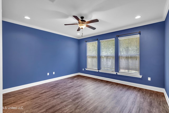 unfurnished room featuring crown molding, ceiling fan, baseboards, and wood finished floors