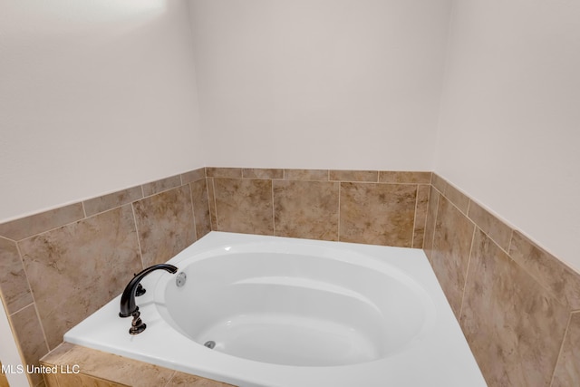 full bathroom featuring a bath