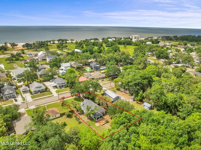 bird's eye view featuring a water view and a residential view