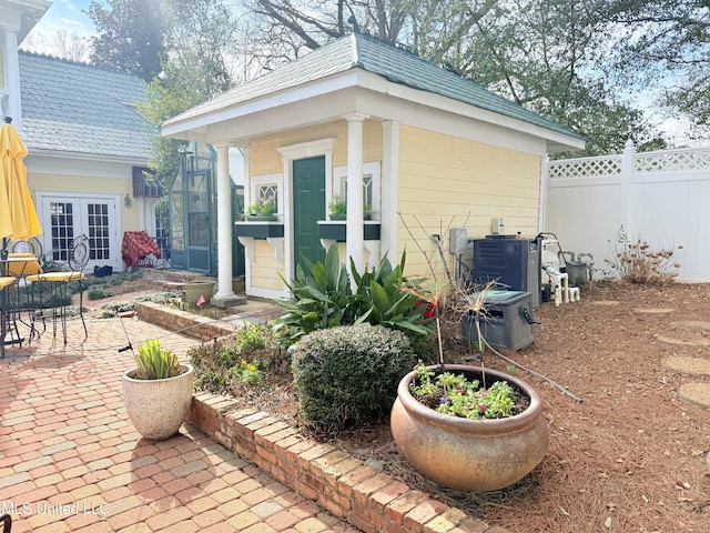 521 Holland Ave, Philadelphia, MS 39350 - view of outbuilding featuring french doors and central AC unit