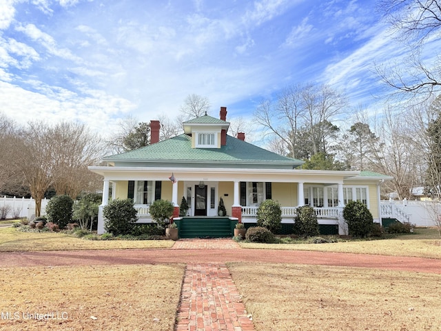 521 Holland Ave, Philadelphia, MS 39350 - view of front of home with a front lawn and a porch