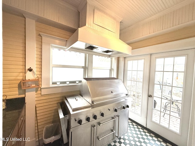 521 Holland Ave, Philadelphia, MS 39350 - miscellaneous room with wood walls and french doors
