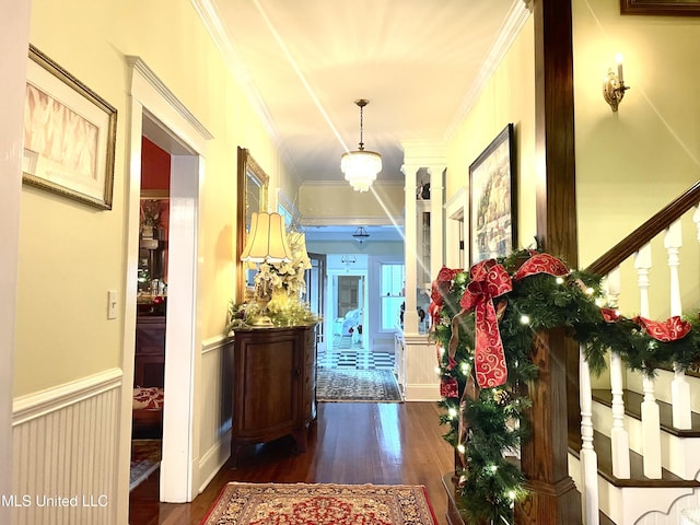 521 Holland Ave, Philadelphia, MS 39350 - hallway featuring dark wood-type flooring, crown molding, and a notable chandelier